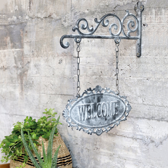 Hangandi skilti "Welcome"