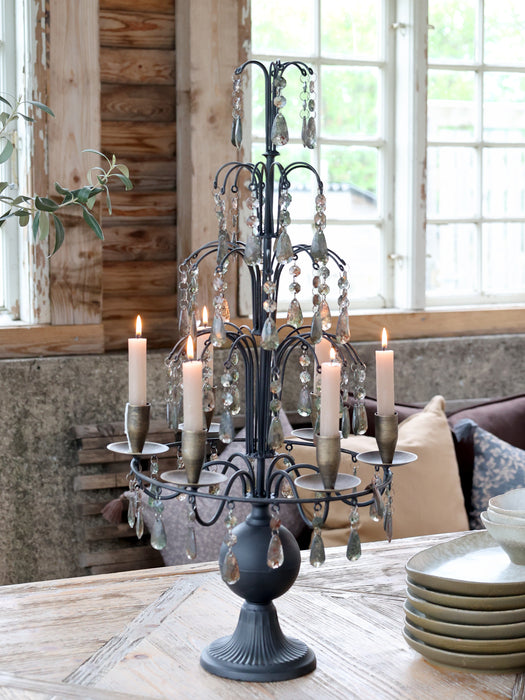 Kertastjaki á fæti með glersteinum